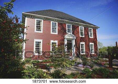 Stock Image - jordan, ontario, canada; a large red colonial house. Fotosearch
