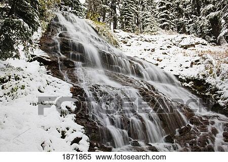 Stock Photography - oregon cascades, oregon, united states of america; first snow fall along umbrella falls on mount hood. Fotosearch