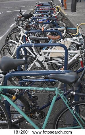 Stock Image - portland, oregon, united states of america; a row of bicycles. Fotosearch