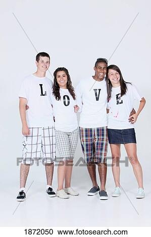 teenage couples wearing t-shirts with the message 'love' View Large Photo Image Stock Image - teenage couples wearing t-shirts with the message 'love'. Fotosearch