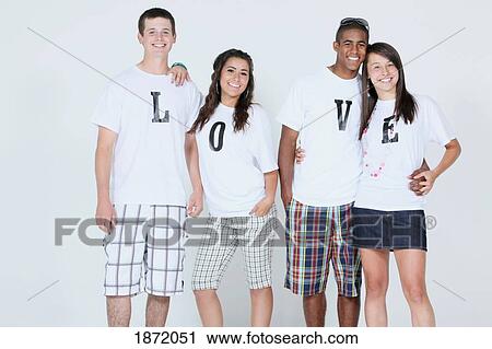 teenage couples wearing t-shirts with the message 'love' View Large Photo Image Stock Image - teenage couples wearing t-shirts with the message 'love'. Fotosearch