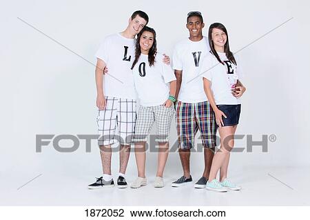 teenage couples wearing t-shirts with the message 'love' View Large Photo Image Stock Image - teenage couples wearing t-shirts with the message 'love'. Fotosearch