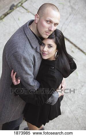 a couple in an embrace from a high angle View Large Photo Image Stock Photography - a couple in an embrace from a high angle. Fotosearch