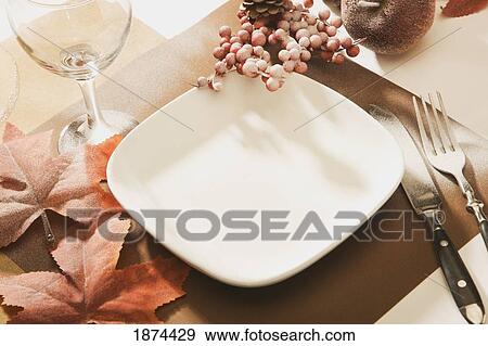 a dinner place setting decorated for autumn View Large Photo Image Stock Photo - a dinner place setting decorated for autumn. Fotosearch