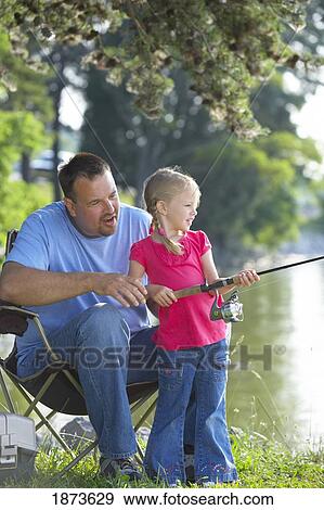 Stock Photo - a father and daughter fishing. Fotosearch