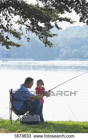 Stock Image - a father and daughter fishing together. Fotosearch