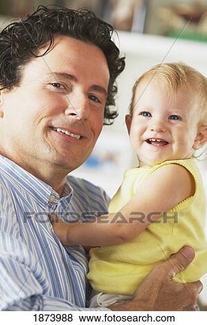 Stock Photo - a father with his young daughter. Fotosearch