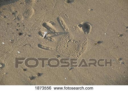 a hand print in the sand View Large Photo Image Stock Photograph - a hand print in the sand. Fotosearch