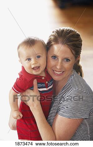 a mother and her young son View Large Photo Image Picture - a mother and her young son. Fotosearch