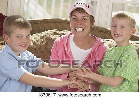Stock Photo - a mother with her two sons. Fotosearch