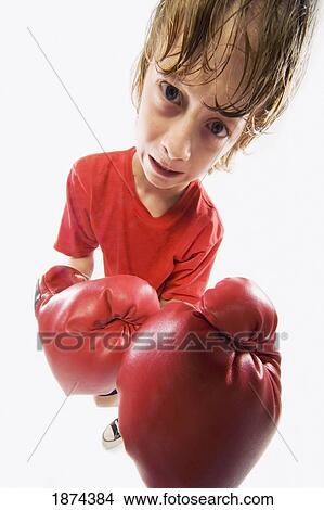 a sweaty boy with boxing gloves View Large Photo Image Picture - a sweaty boy with boxing gloves. Fotosearch