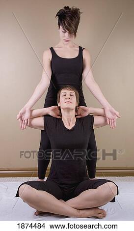 a woman getting a thai massage View Large Photo Image Picture - a woman getting a thai massage. Fotosearch