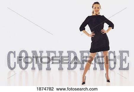 a woman standing with confidence View Large Photo Image Stock Image - a woman standing with confidence. Fotosearch