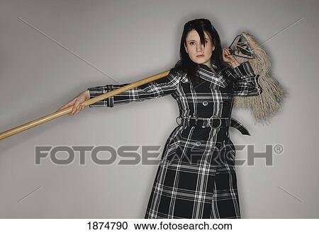 a woman with a mop View Large Photo Image Stock Image - a woman with a mop. Fotosearch