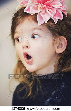 a young girl with a surprised look on her face View Large Photo Image Stock Photography - a young girl with a surprised look on her face. Fotosearch