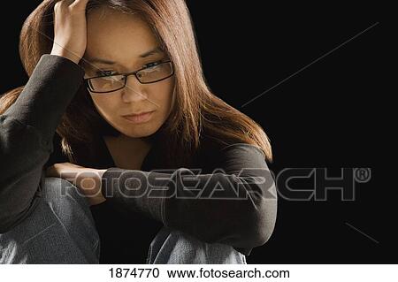 a young woman looking sad View Large Photo Image Stock Image - a young woman looking sad. Fotosearch