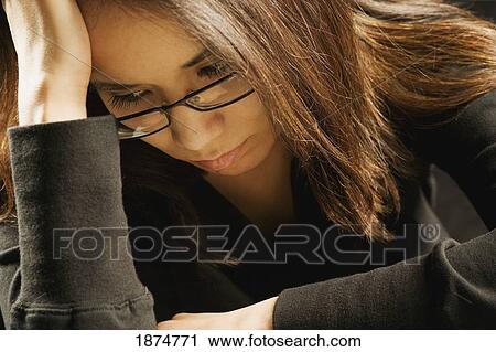 a young woman looking sad View Large Photo Image Stock Image - a young woman looking sad. Fotosearch