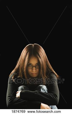 a young woman looking sad View Large Photo Image Stock Photo - a young woman looking sad. Fotosearch