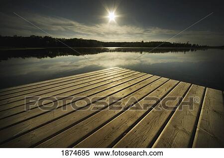 Stock Photography - alberta, canada; a dock on a lake. Fotosearch
