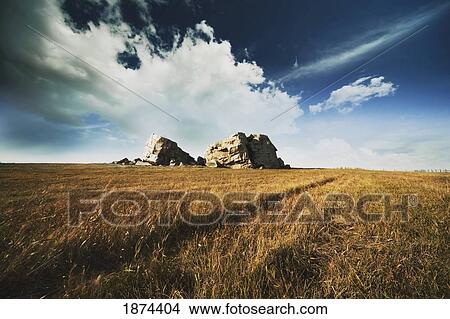 alberta, canada; a large rock on a field View Large Photo Image Picture - alberta, canada; a large rock on a field. Fotosearch