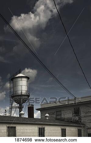 alberta, canada; a water tower and old buildings View Large Photo Image Stock Photo - alberta, canada; a water tower and old buildings. Fotosearch