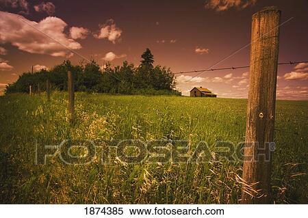 alberta, canada; an old barn and fence View Large Photo Image Stock Photography - alberta, canada; an old barn and fence. Fotosearch