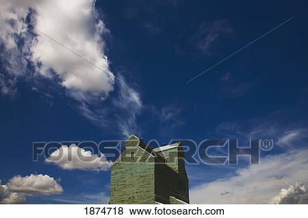 alberta, canada; clouds in the sky above a grain elevator View Large Photo Image Stock Photo - alberta, canada; clouds in the sky above a grain elevator. Fotosearch