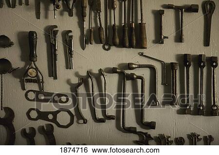 alberta, canada; old tools hanging on the wall View Large Photo Image Stock Photograph - alberta, canada; old tools hanging on the wall. Fotosearch