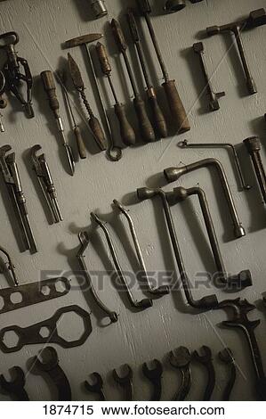 alberta, canada; old tools hanging on the wall View Large Photo Image Stock Photography - alberta, canada; old tools hanging on the wall. Fotosearch