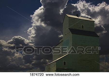 camrose, alberta, canada; clouds in the sky above a grain elevator View Large Photo Image Stock Image - camrose, alberta, canada; clouds in the sky above a grain elevator. Fotosearch