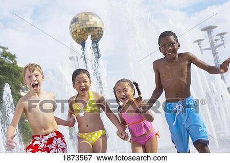 Stock Photo - children together at a water park. Fotosearch