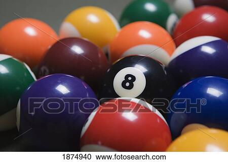 close up of pool balls racked on a billiard table focused on the eight ball View Large Photo Image Stock Image - close up of pool balls racked on a billiard table focused on the eight ball. Fotosearch