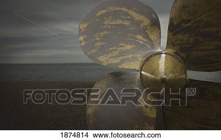 Picture - corpus cristi, texas, united states of america; a ship propellor on the beach. Fotosearch