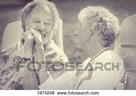 edmonton, alberta, canada; a couple holding hands View Large Photo Image Stock Photo - edmonton, alberta, canada; a couple holding hands. Fotosearch