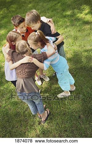 edmonton, alberta, canada; a group of children in a huddle View Large Photo Image Stock Photo - edmonton, alberta, canada; a group of children in a huddle. Fotosearch