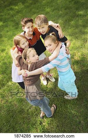 edmonton, alberta, canada; a group of children in a huddle View Large Photo Image Stock Photography - edmonton, alberta, canada; a group of children in a huddle. Fotosearch