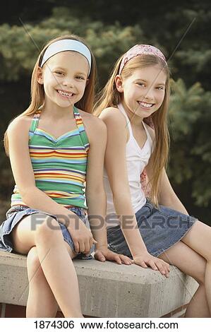 Stock Photograph - edmonton, alberta, canada; two sisters. Fotosearch