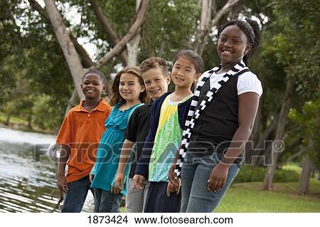 fort lauderdale, florida, united states of america; a group of preteens standing together in a park View Large Photo Image Picture - fort lauderdale, florida, united states of america; a group of preteens standing together in a park. Fotosearch