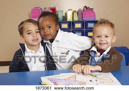 fort lauderdale, florida, united states of america; three young boys coloring at a table in a classroom View Large Photo Image Stock Image - fort lauderdale, florida, united states of america; three young boys coloring at a table in a classroom. Fotosearch