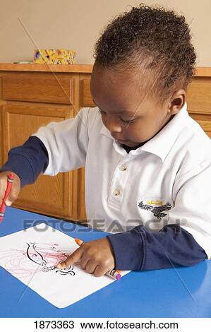 fort lauderdale, florida, united states of america; a young boy coloring at a table View Large Photo Image Stock Image - fort lauderdale, florida, united states of america; a young boy coloring at a table. Fotosearch