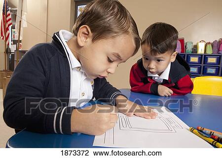 fort lauderdale, florida, united states of america; two young boys coloring at a table in a classroom View Large Photo Image Stock Image - fort lauderdale, florida, united states of america; two young boys coloring at a table in a classroom. Fotosearch
