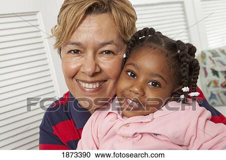 fort lauderdale, florida, united states of america; a teacher hugs a young girl View Large Photo Image Stock Image - fort lauderdale, florida, united states of america; a teacher hugs a young girl. Fotosearch