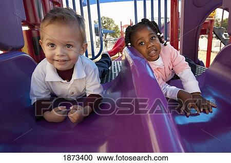 fort lauderdale, florida, united states of america; two young children playing at a playground View Large Photo Image Stock Image - fort lauderdale, florida, united states of america; two young children playing at a playground. Fotosearch
