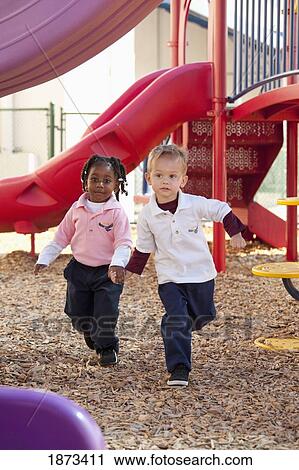 fort lauderdale, florida, united states of america; two young children playing at a playground View Large Photo Image Stock Image - fort lauderdale, florida, united states of america; two young children playing at a playground. Fotosearch