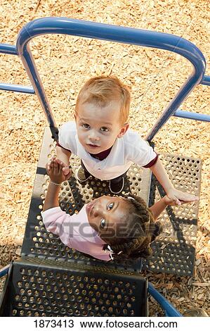 fort lauderdale, florida, united states of america; two young children playing at a playground View Large Photo Image Stock Image - fort lauderdale, florida, united states of america; two young children playing at a playground. Fotosearch