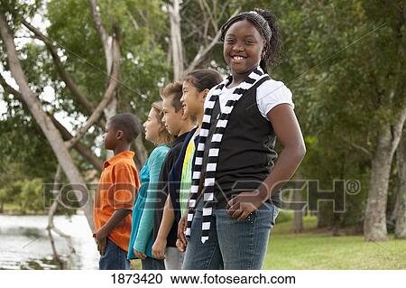 Stock Image - fort lauderdale, florida, united states of america; a group of preteens standing together. Fotosearch