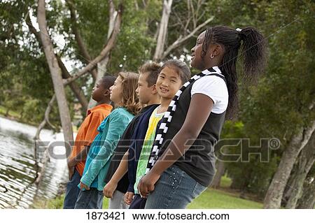 fort lauderdale, florida, united states of america; a group of preteens standing together in a park View Large Photo Image Stock Image - fort lauderdale, florida, united states of america; a group of preteens standing together in a park. Fotosearch