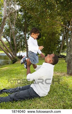 fort lauderdale, florida, united states of america; a father playing with his son View Large Photo Image Stock Image - fort lauderdale, florida, united states of america; a father playing with his son. Fotosearch