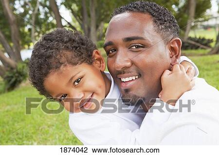 Stock Image - fort lauderdale, florida, united states of america; a father with his son. Fotosearch
