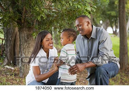 fort lauderdale, florida, united states of america; a mother and father with their young son in the park View Large Photo Image Stock Image - fort lauderdale, florida, united states of america; a mother and father with their young son in the park. Fotosearch